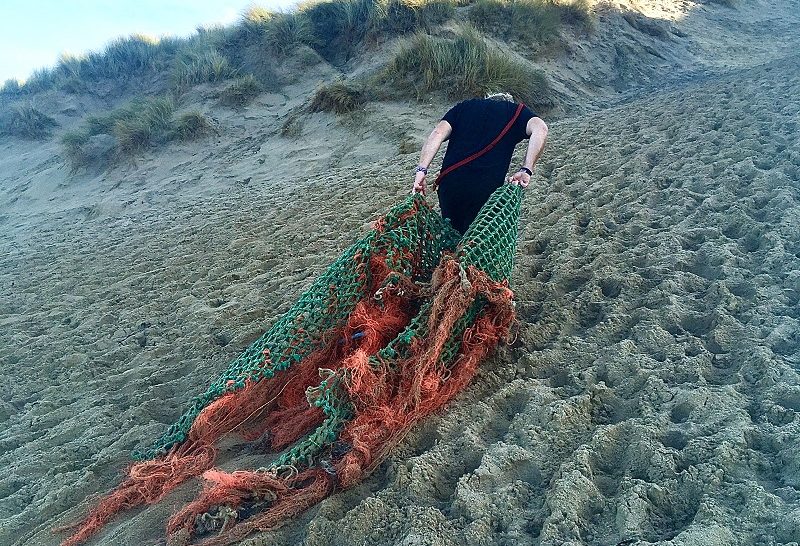 Adam recovering Ghost Gear from local Cornish beach